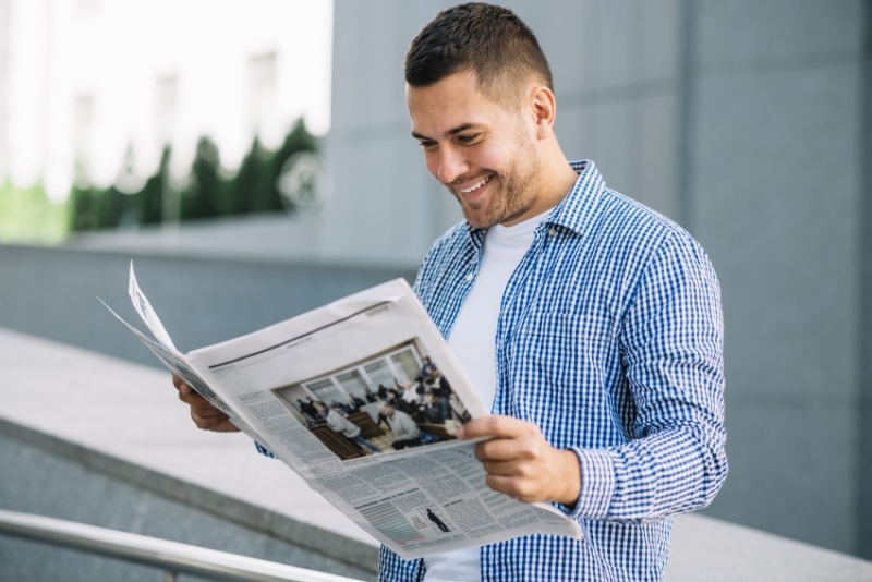 Man reading the newspaper.