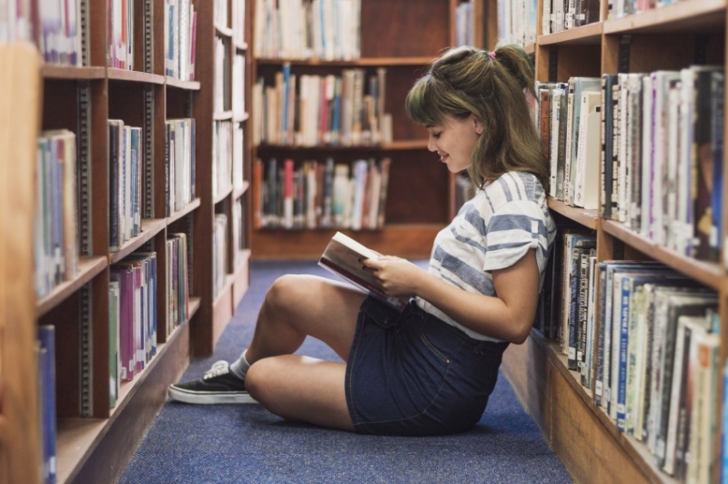 Girl reading in library