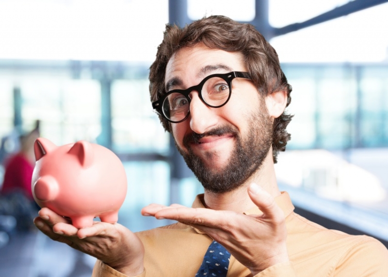 Man holding piggy bank.