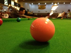 Example of the present continuous: They are playing snooker