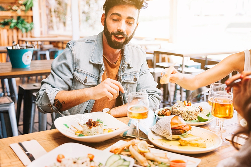 A man eating in a restaurant